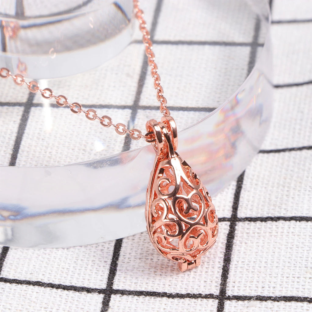 1pc Hollowed-Out Waterdrop Pendant Rose Gold Aromatherapy Ball Necklace For Women Pelelith Jewelry Gift Creative Chain Accessory