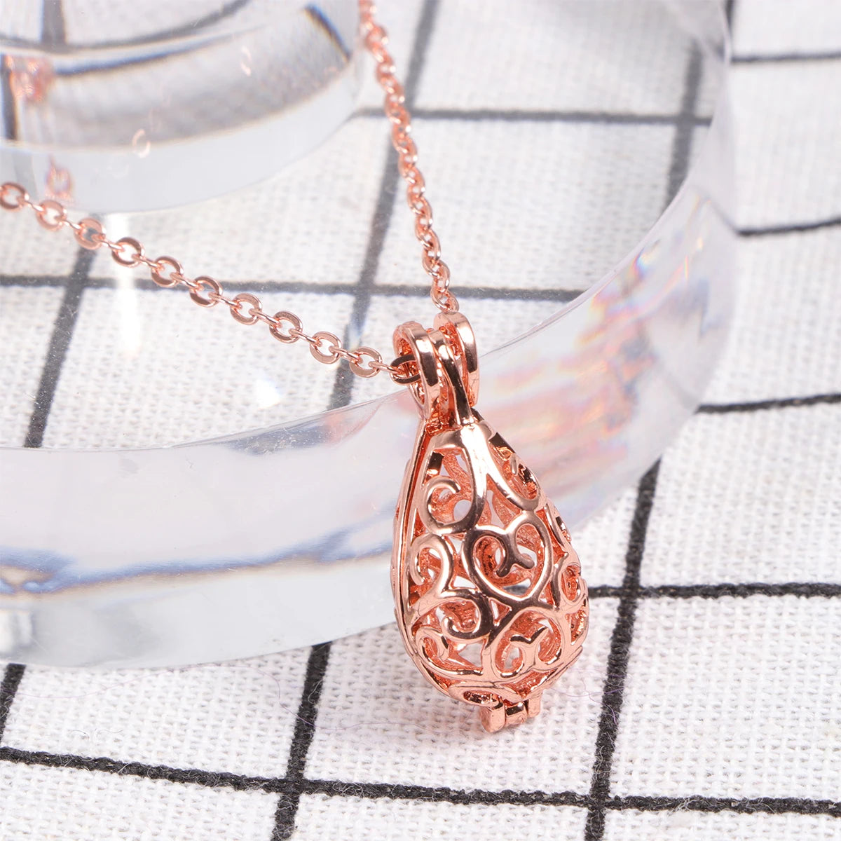 1pc Hollowed-Out Waterdrop Pendant Rose Gold Aromatherapy Ball Necklace For Women Pelelith Jewelry Gift Creative Chain Accessory